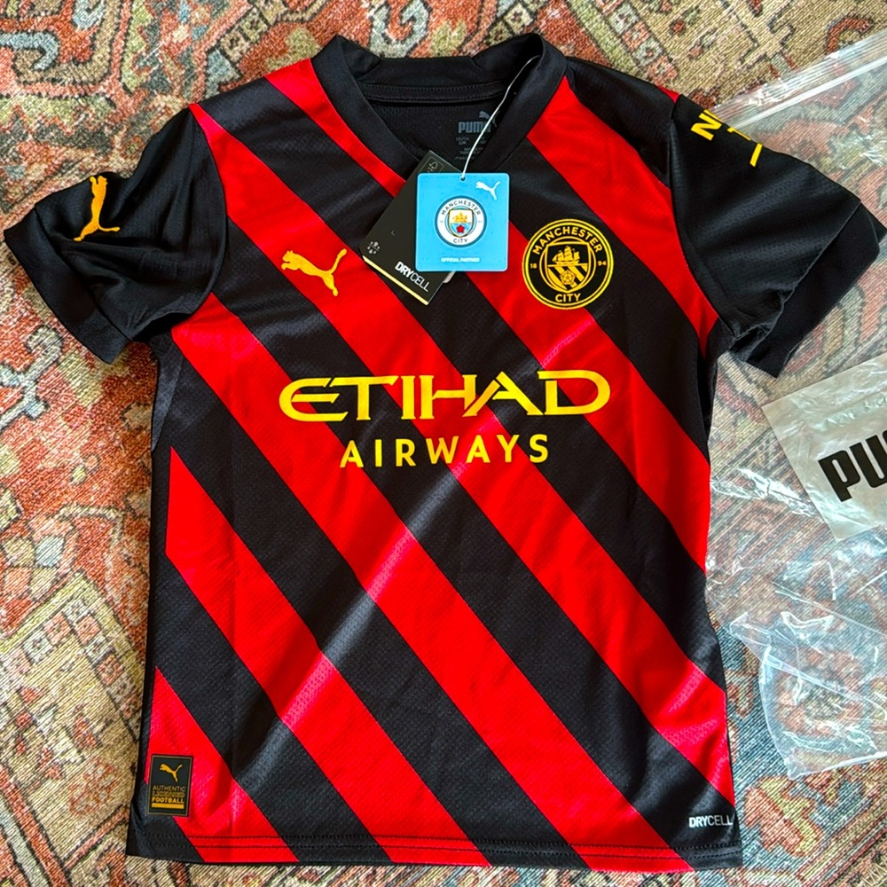 NWT Puma Manchester City jersey. Youth size S.